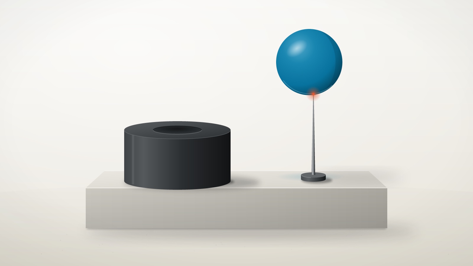 A teal ball balanced on a thin needle on a studio plinth, beside a dark solid base with an empty socket, a small orange glow at the tip.